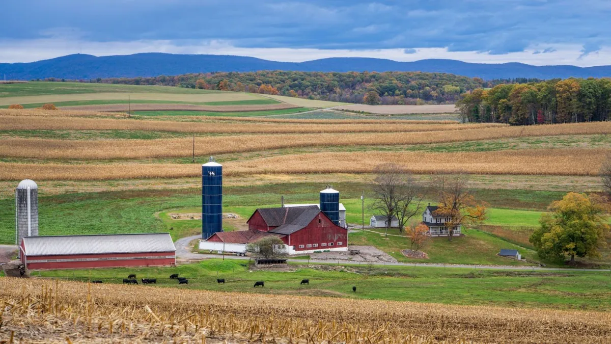 Open fields and a farmstead in rural Pennsylvania