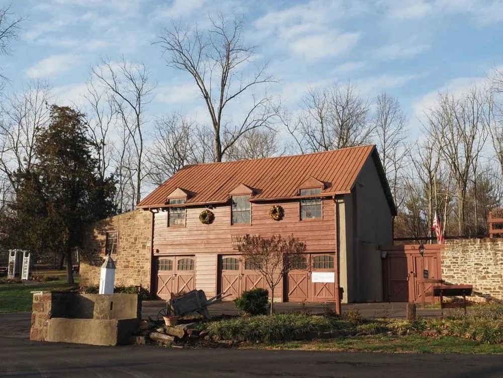 Stone and wood barn in the Pennsylvania countryside, like the on-lot septic properties around Sellersville, PA